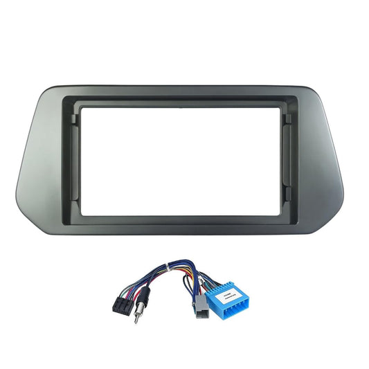 9-inch Android head unit fascia frame for Maruti Grand Vitara featuring a scratch-resistant finish and included plug-and-play power cable connector.