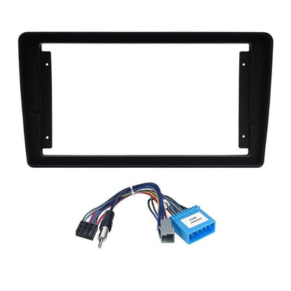 9-inch Android stereo fascia frame for Mahindra XUV 500 with a scratch-resistant finish and matching OEM-style power cable connector.