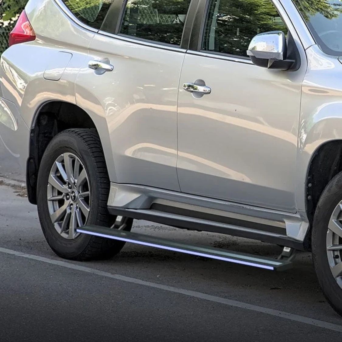 Mitsubishi Pajero 2019+ RGB Electric Side Step (App Controlled) | 300KG Load Capacity | Automatic Door Opening | 1.5 Second Extension | ADC-12 Aluminium Alloy Body | 2 Years Warranty