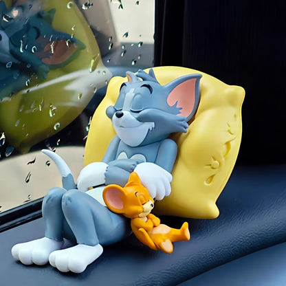Tom and Jerry sleeping cat and mouse figurine on a yellow cushion for car dashboard and tabletop decoration.